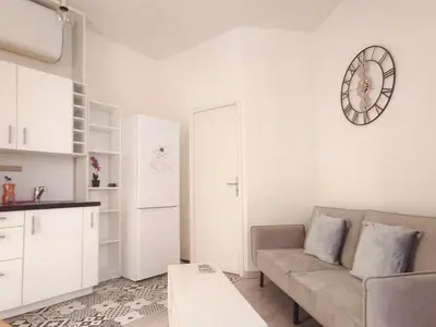 Cuisine ou kitchenette dans l'établissement Bel appartement au Marais de Paris