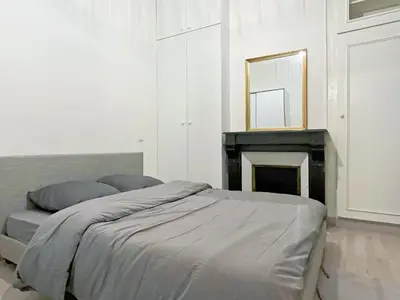 Un ou plusieurs lits dans un hébergement de l'établissement Bel appartement au Marais de Paris