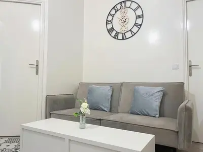 Coin salon dans l'établissement Bel appartement au Marais de Paris