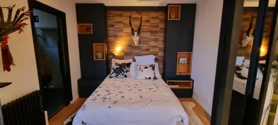 Un ou plusieurs lits dans un hébergement de l'établissement Appartement vue Tour Eiffel paris 16 Eme