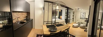 Coin salon dans l'établissement Appartement vue Tour Eiffel paris 16 Eme