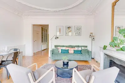 Coin salon dans l'établissement Appartement spacieux à deux pas de Notre-Dame