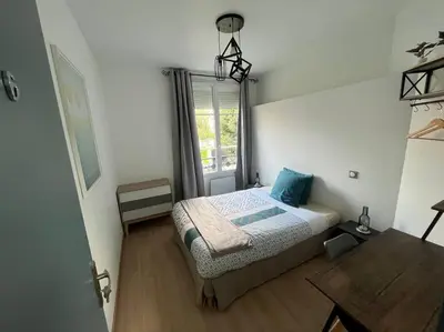 Un ou plusieurs lits dans un hébergement de l'établissement V - Villa 2022 PARIS EXPO-3min metro-8 rooms-12 beds
