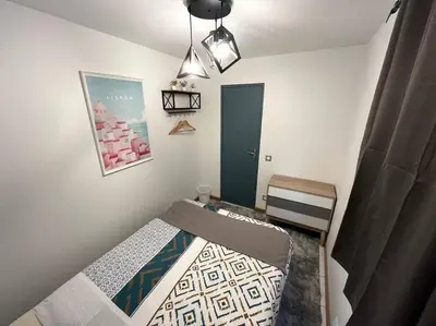Un ou plusieurs lits dans un hébergement de l'établissement V - Villa 2022 PARIS EXPO-3min metro-8 rooms-12 beds