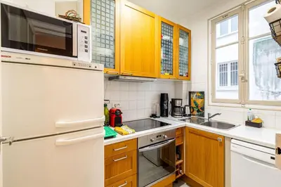 Cuisine ou kitchenette dans l'établissement GuestReady - Bel Apt charmant près de Montmartre