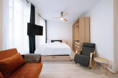 Un ou plusieurs lits dans un hébergement de l'établissement Cosy Studio Apartment - Bastille