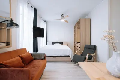 Un ou plusieurs lits dans un hébergement de l'établissement Cosy Studio Apartment - Bastille