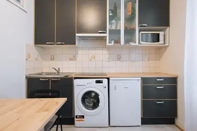 Cuisine ou kitchenette dans l'établissement Cosy Studio Apartment - Bastille