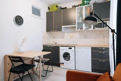 Cuisine ou kitchenette dans l'établissement Cosy Studio Apartment - Bastille