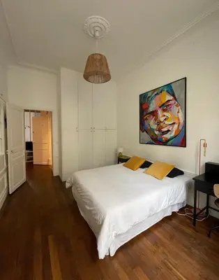 Un ou plusieurs lits dans un hébergement de l'établissement Homy and Cosy private flat - Paris
