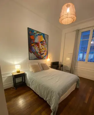 Un ou plusieurs lits dans un hébergement de l'établissement Homy and Cosy private flat - Paris