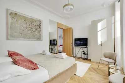 Un ou plusieurs lits dans un hébergement de l'établissement Welcoming apt - 3BR-6P - Tour Eiffel