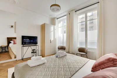 Un ou plusieurs lits dans un hébergement de l'établissement Welcoming apt - 3BR-6P - Tour Eiffel