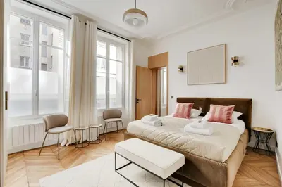 Un ou plusieurs lits dans un hébergement de l'établissement Welcoming apt - 3BR-6P - Tour Eiffel