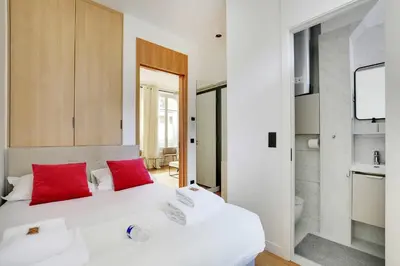 Un ou plusieurs lits dans un hébergement de l'établissement Welcoming apt - 3BR-6P - Tour Eiffel