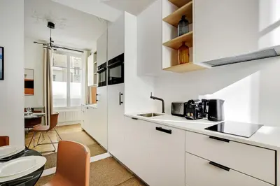 Cuisine ou kitchenette dans l'établissement Welcoming apt - 3BR-6P - Tour Eiffel