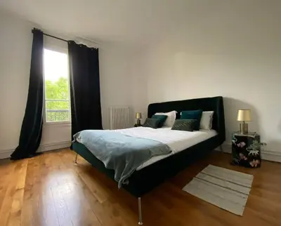 Un ou plusieurs lits dans un hébergement de l'établissement Le Cœur de l’Île Saint-Louis, you will love it!
