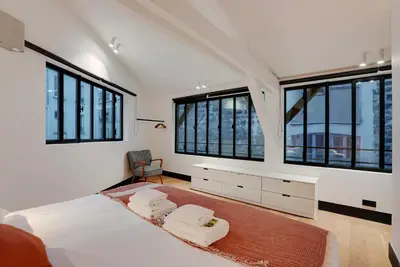 Un ou plusieurs lits dans un hébergement de l'établissement Luxury apartment 4 BEDR - Sacré Coeur Montmartre