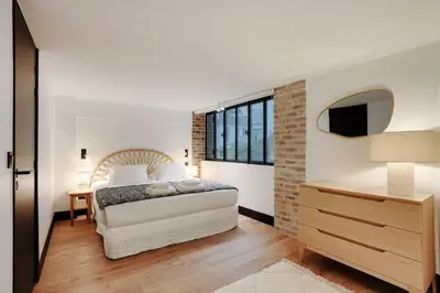 Un ou plusieurs lits dans un hébergement de l'établissement Luxury apartment 4 BEDR - Sacré Coeur Montmartre