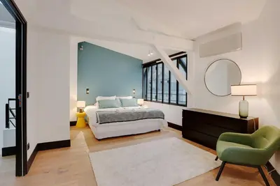 Un ou plusieurs lits dans un hébergement de l'établissement Luxury apartment 4 BEDR - Sacré Coeur Montmartre