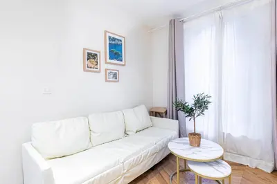 Coin salon dans l'établissement GuestReady - Paris Delight near the metro station