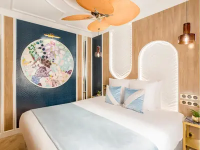 Un ou plusieurs lits dans un hébergement de l'établissement Merveil - Luxury Suite - Notre Dame - Boulangers