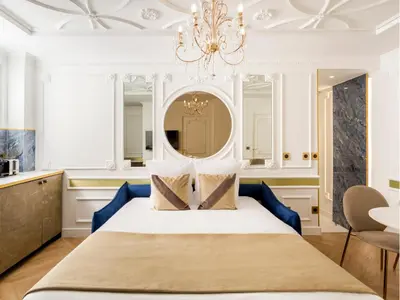 Un ou plusieurs lits dans un hébergement de l'établissement Merveil - Luxury Suite - Notre Dame - Boulangers