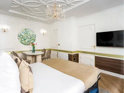 Télévision ou salle de divertissement dans l'établissement Merveil - Luxury Suite - Notre Dame - Boulangers