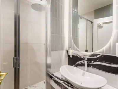Salle de bains dans l'établissement Merveil - Luxury Suite - Notre Dame - Boulangers