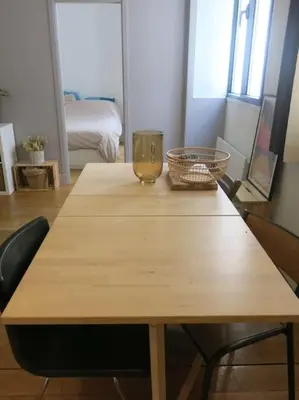 Un ou plusieurs lits dans un hébergement de l'établissement Petit Vinaigriers République CityCosy