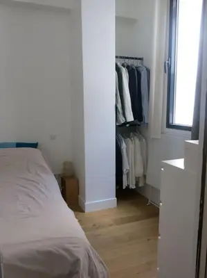 Un ou plusieurs lits dans un hébergement de l'établissement Petit Vinaigriers République CityCosy