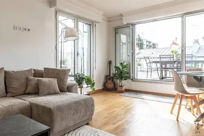 Coin salon dans l'établissement Magnificient Terrace 6 pers flat