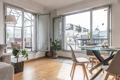 Coin salon dans l'établissement Magnificient Terrace 6 pers flat