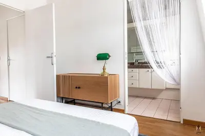 Un ou plusieurs lits dans un hébergement de l'établissement Magnificient Terrace 6 pers flat