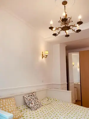 Un ou plusieurs lits dans un hébergement de l'établissement Parisian style Appartment Private room with Shared bathroom near Bastille and Gare de Lyon