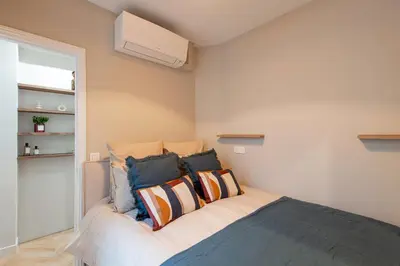 Un ou plusieurs lits dans un hébergement de l'établissement The New Suites, Paris Centre