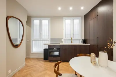 Cuisine ou kitchenette dans l'établissement The New Suites, Paris Centre