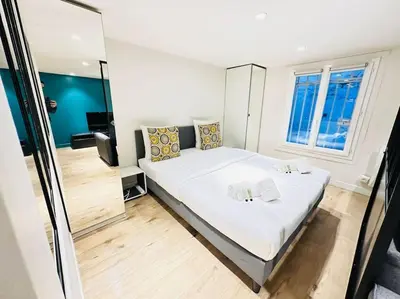 Un ou plusieurs lits dans un hébergement de l'établissement Great flat in center of Paris