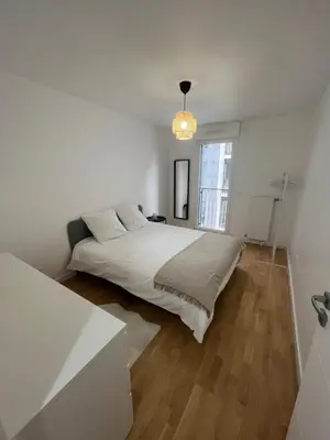 Un ou plusieurs lits dans un hébergement de l'établissement appartement 4 pièces spacieux grande terrasse