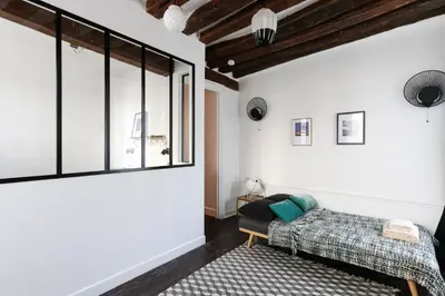 Un ou plusieurs lits dans un hébergement de l'établissement Paris, Bastille, Style atelier d artiste