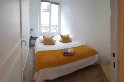 Un ou plusieurs lits dans un hébergement de l'établissement Bastille - Lappe - Quartier anime