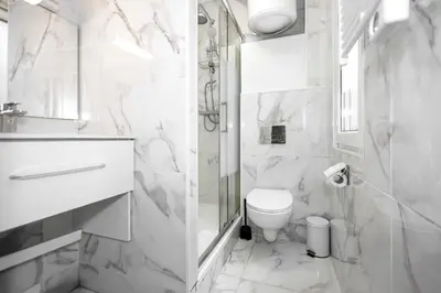 Salle de bains dans l'établissement Nets Inn Apartments - La Villette