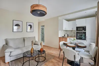 Cuisine ou kitchenette dans l'établissement Apartment La Défense by Studio prestige