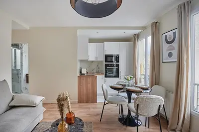 Cuisine ou kitchenette dans l'établissement Apartment La Défense by Studio prestige