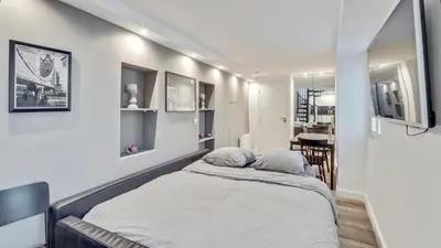 Un ou plusieurs lits dans un hébergement de l'établissement 07 Tour Eiffel - Maison pour 5 personnes
