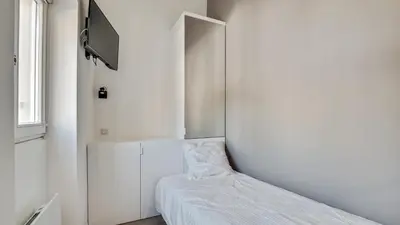 Un ou plusieurs lits dans un hébergement de l'établissement 07 Tour Eiffel - Maison pour 5 personnes