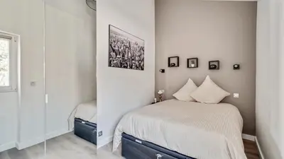 Un ou plusieurs lits dans un hébergement de l'établissement 07 Tour Eiffel - Maison pour 5 personnes