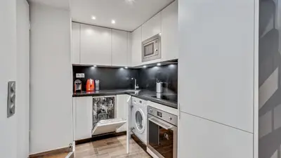 Cuisine ou kitchenette dans l'établissement 07 Tour Eiffel - Maison pour 5 personnes