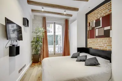 Un ou plusieurs lits dans un hébergement de l'établissement Bastille - Gare de Lyon - Appartement familial