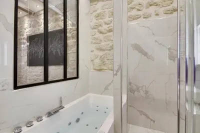 Salle de bains dans l'établissement Bastille - Gare de Lyon - Appartement familial